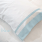 blue-grenobl;e-pillow-with-type